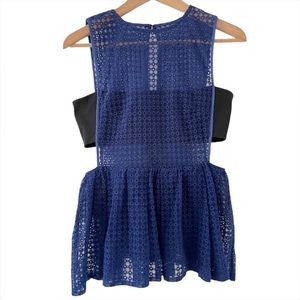 Self portrait embroidered peplum top.